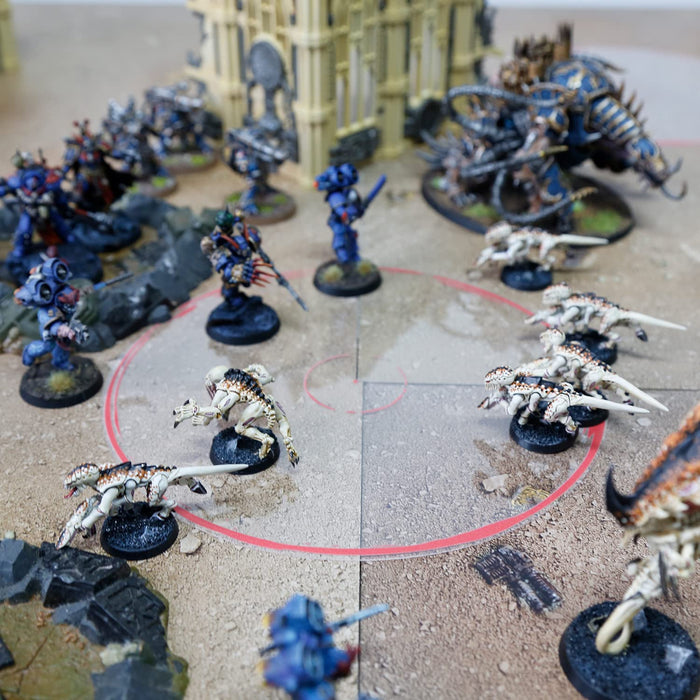 This markers are transparent, and fit any game mat.